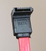 A 7-pin Serial ATA data cable.